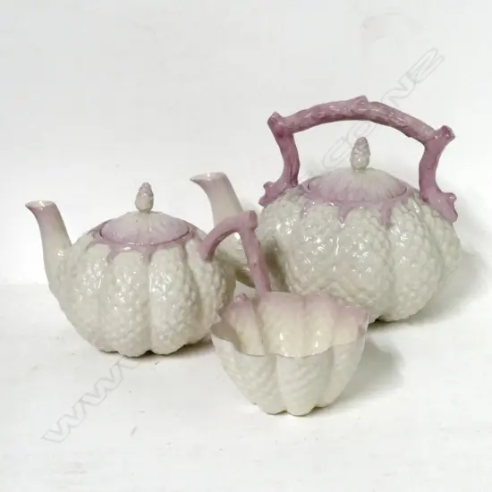 A Belleek three-piece tea set