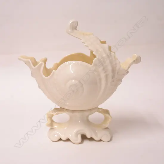 A Belleek green mark nautilus shell vase