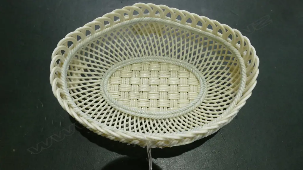 A Belleek open weave basket Image 1++