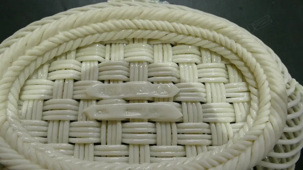 A Belleek open weave basket Image 1++