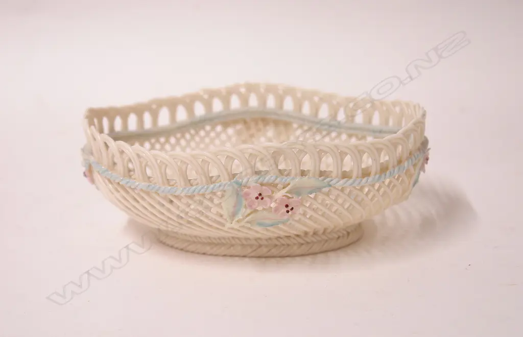 A Belleek open weave basket Image 1++