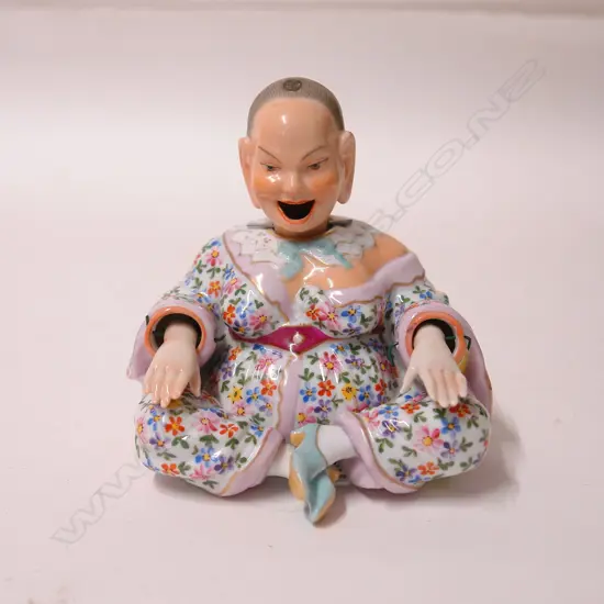 A European chinoiserie 'Nodding Head' figurine in the Meissen manner