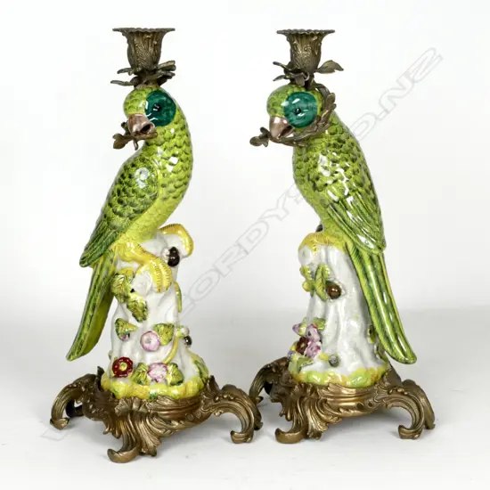 A pair of china and ormolu candlesticks