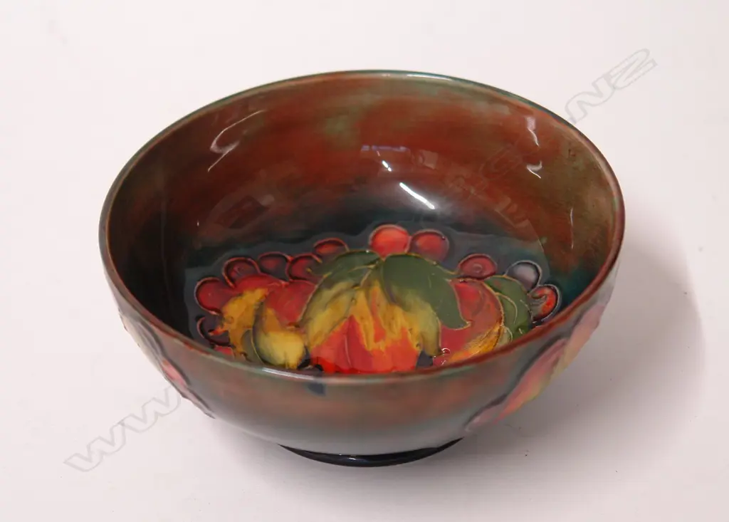 A Walter Moorcroft Leaf and Berry patterned footed bowl Image 1++