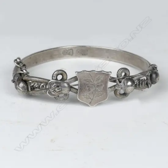 An early 20thC Chinese silver hinged bangle