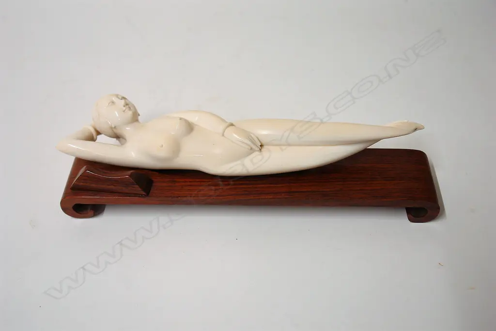 A Chinese ivory medicine doll Image 1++