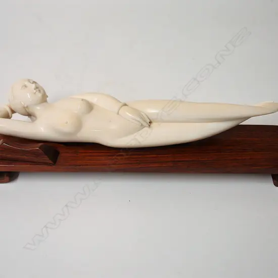 A Chinese ivory medicine doll