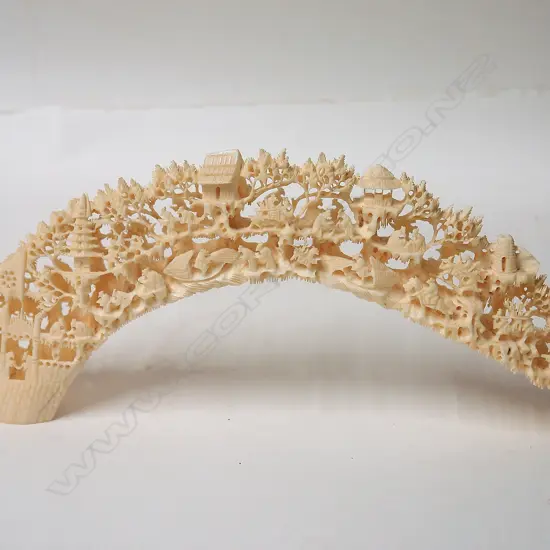 A vintage Chinese finely carved hippopotamus tusk