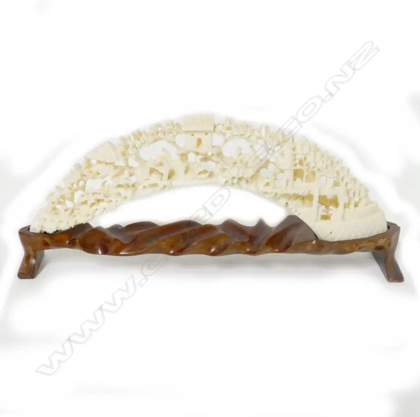 An ornately carved hippopotamus tusk Image 1++