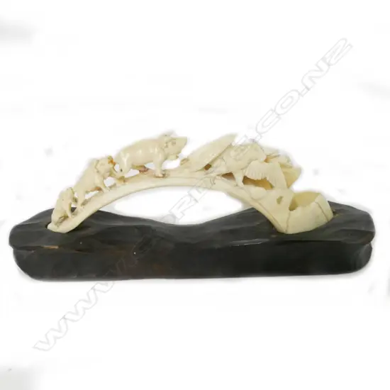 A carved warthog tusk