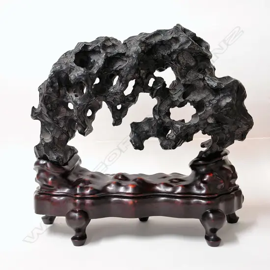 A vintage Oriental scholar's rock on stand