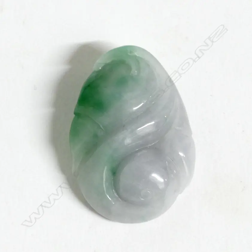 A Chinese jade carved pendant Image 1++