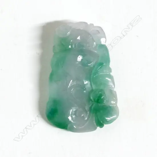 A small Chinese jade pendant plaque
