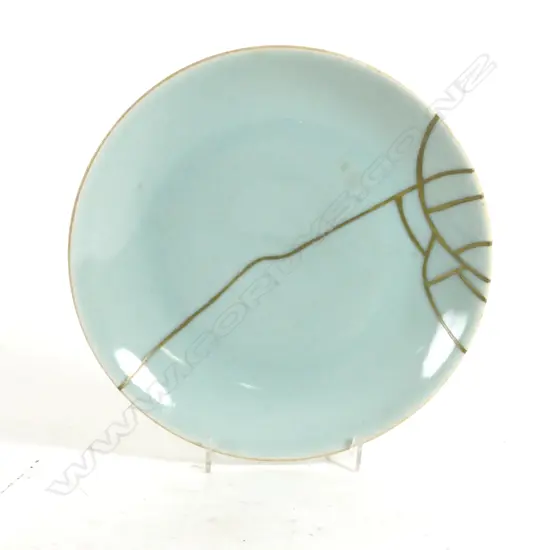 A Chinese Qing period celadon plate