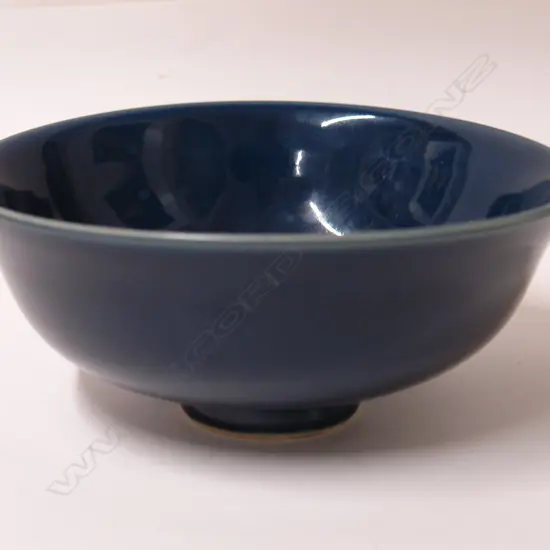 A Chinese monochrome blue glazed footed bowl
