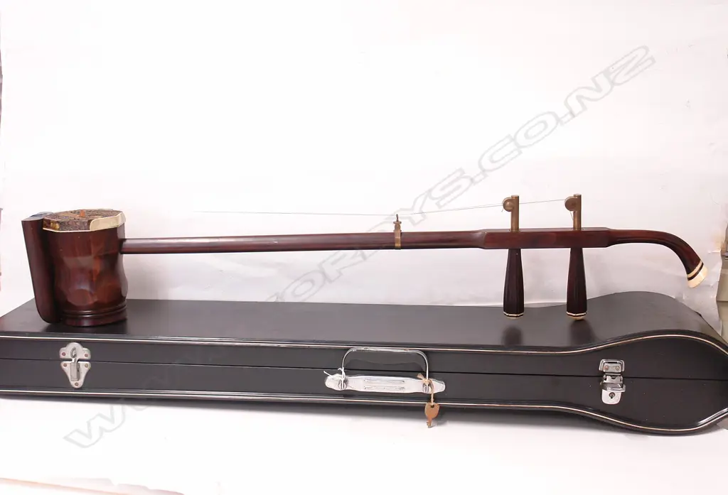 A Chinese rosewood and bone erhu musical instrument Image 1++
