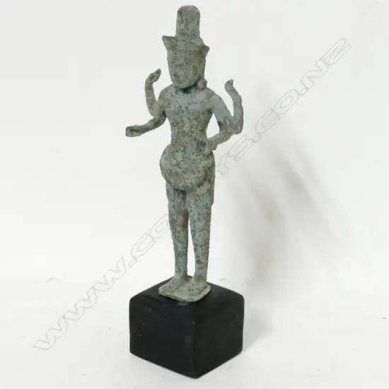 A small metal Khmer temple statue