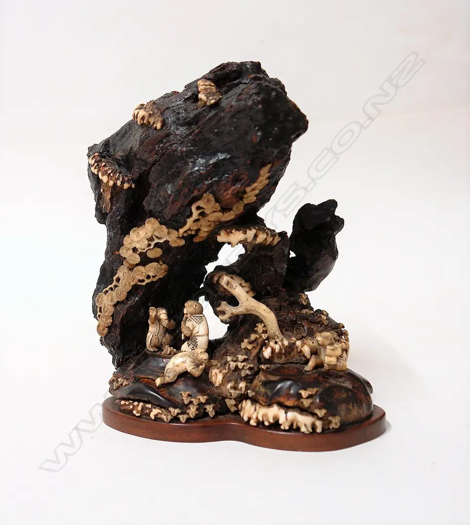 A Japanese gnarled wood and bone grotto type carving Image 1++