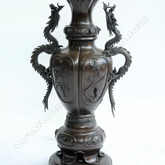 A large 19thC Japanese bronze baluster urn
