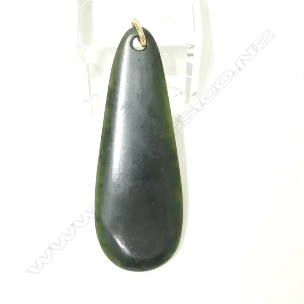 A vintage N.Z. large dark greenstone pendant Image 1++