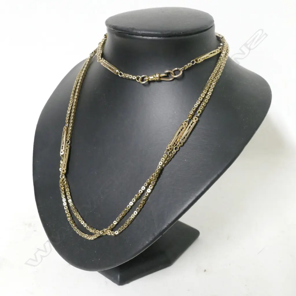 A 9ct. gold muff chain Image 1++