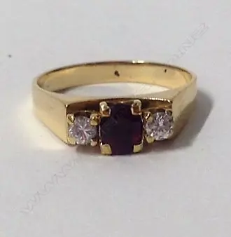 An 18ct. gold ruby and diamond ring Image 1++