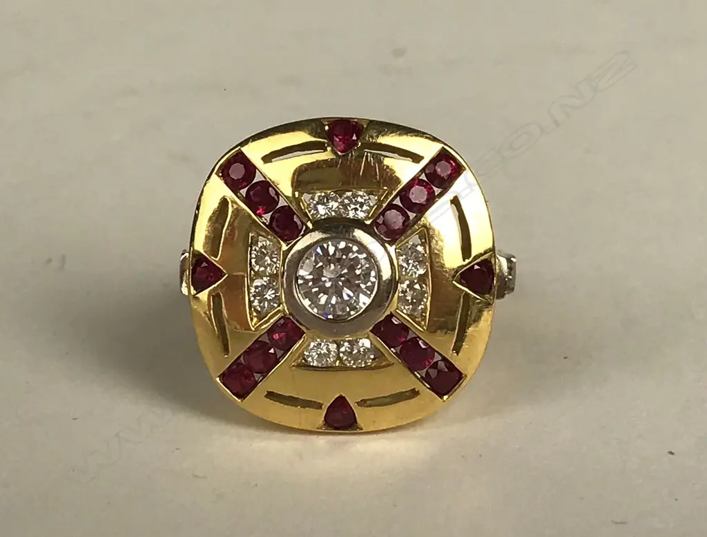 An 18ct. gold ruby and diamond ring Image 1++
