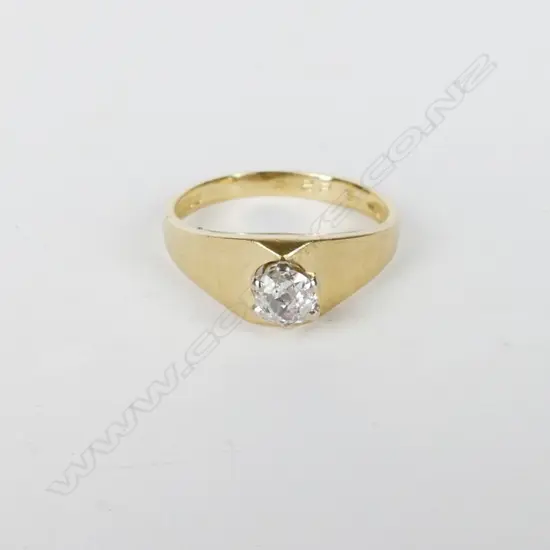An 18ct. gold and diamond solitaire ring