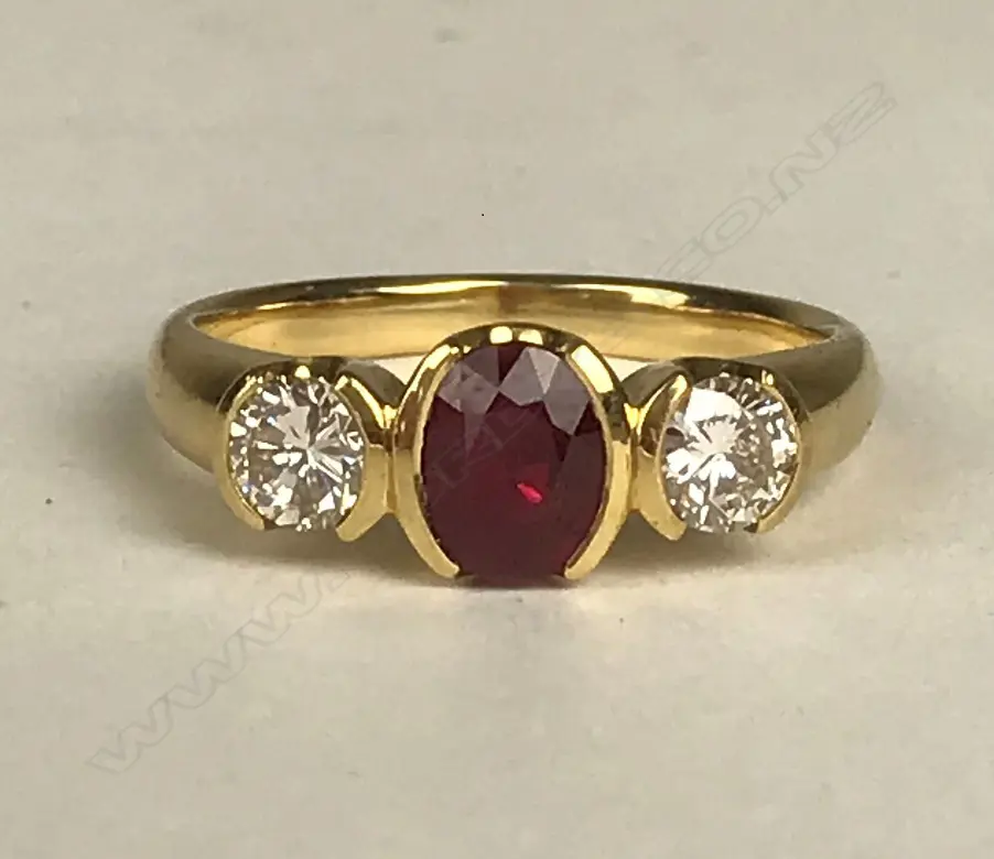 An 18ct. gold ruby and diamond ring Image 1++