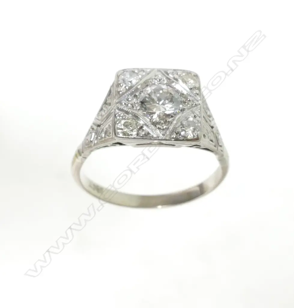 An Art Deco style 18ct. white gold and diamond ring Image 1++