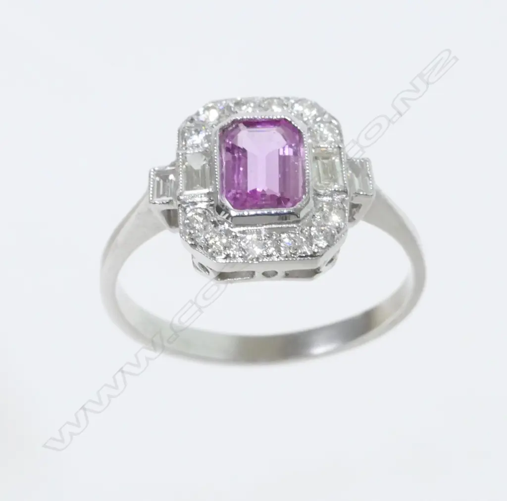 An Art Deco style 18ct. white gold diamond and pink sapphire ring Image 1++