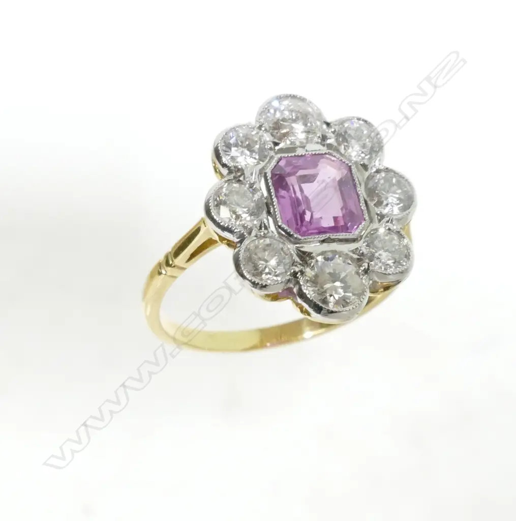 An Art Deco style 18ct. gold diamond and pink sapphire ring Image 1++