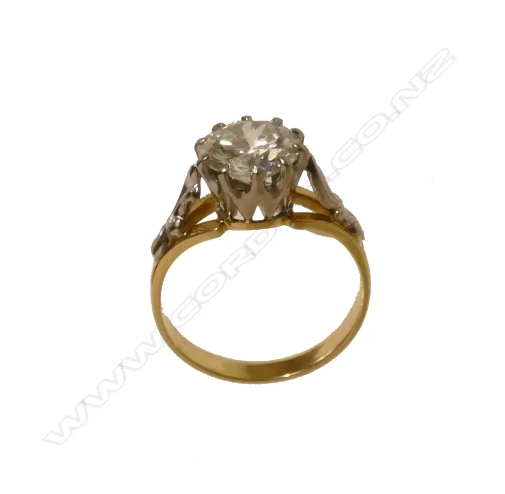 An 18ct. gold and diamond solitaire ring Image 1++