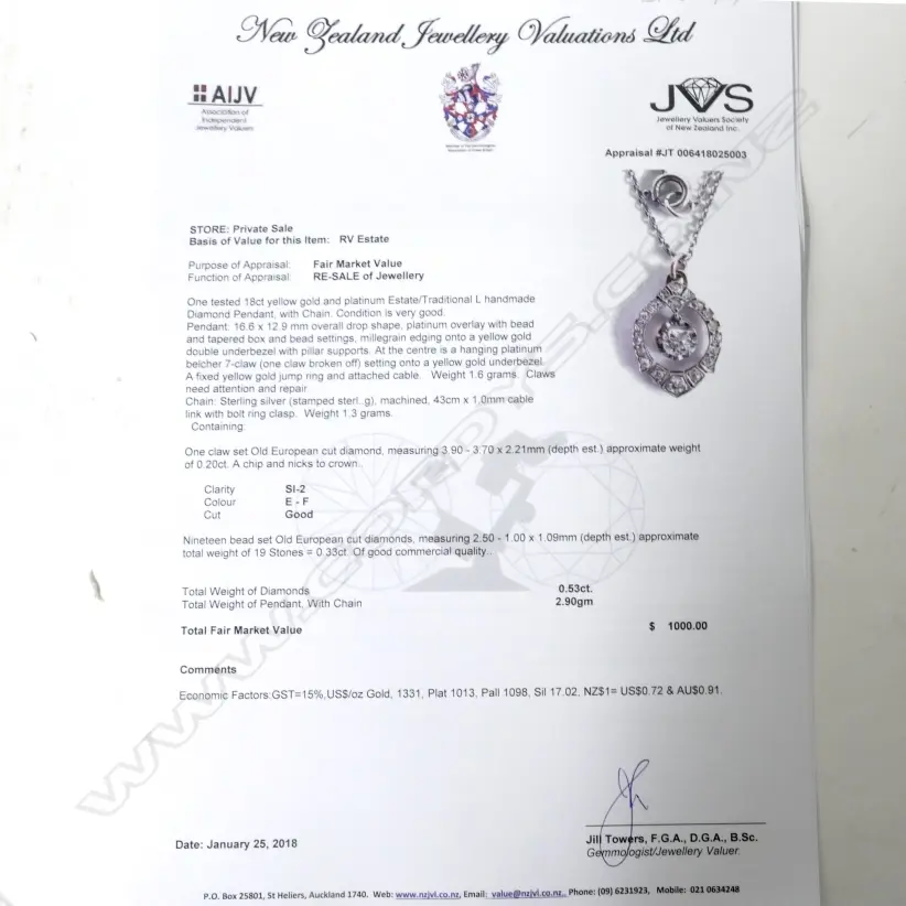 An estate 18ct. gold and platinum diamond pendant Image 1++