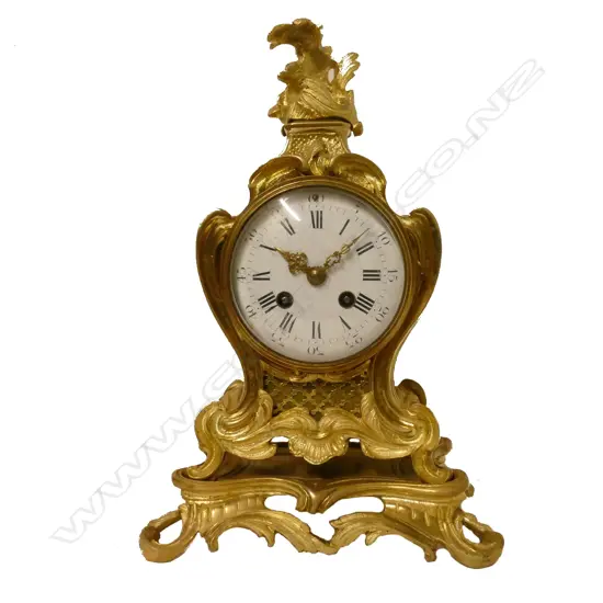 A French Rococo ormolu mantel clock