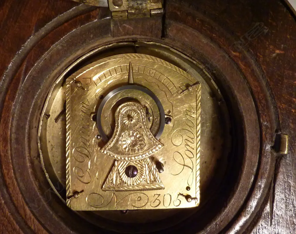A sedan chair clock with brass bound 'milestone' case and traditional hanger and latched hinged back flap to permit rear winding with included key Image 1++