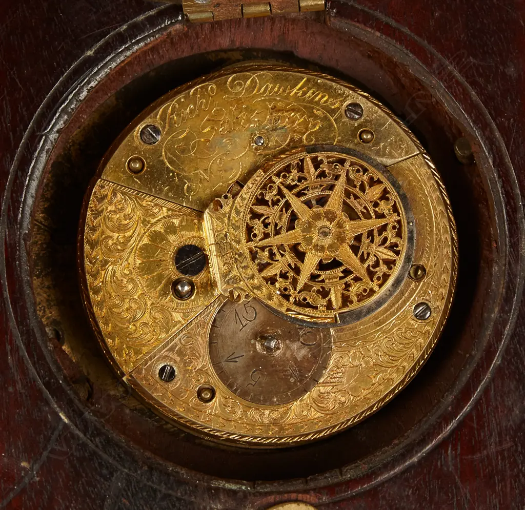 A sedan chair clock with circular turned mahogany case and traditional hanger and latched hinged back flap to permit rear winding with included key Image 1++