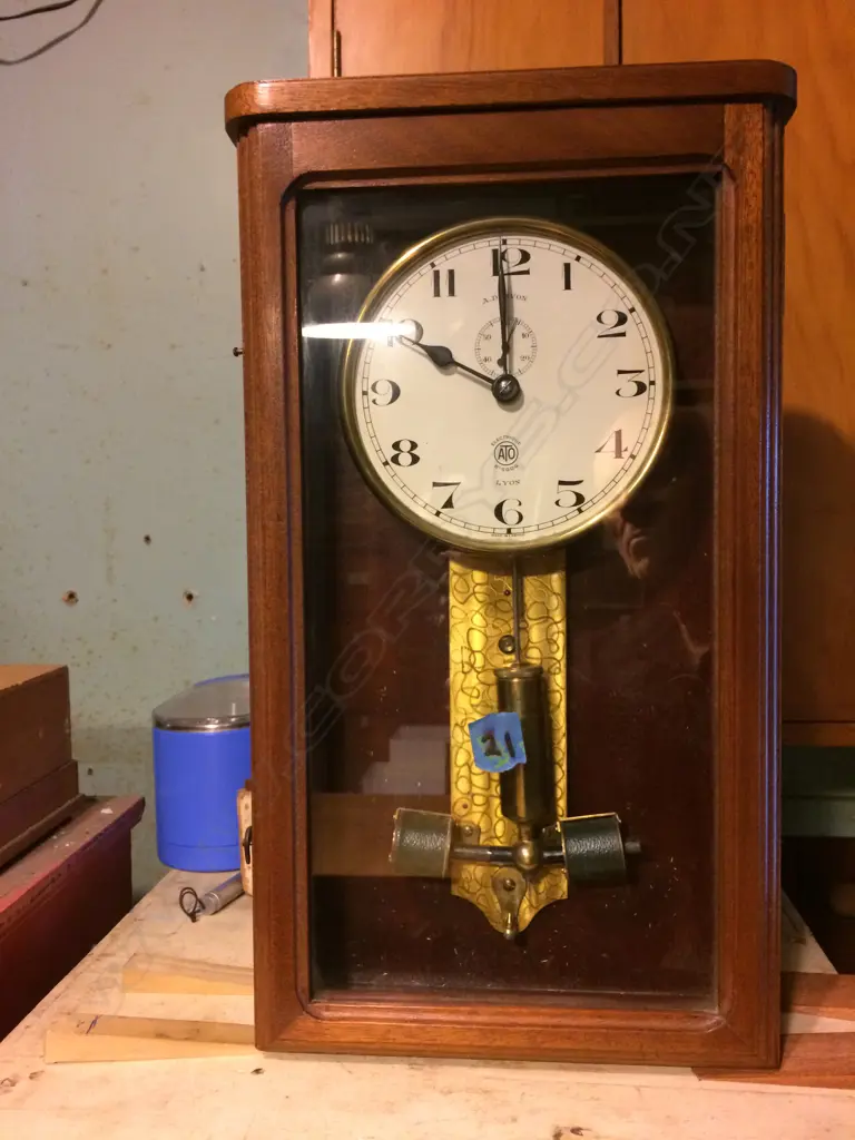 A French electro-mechanical wall clock in mahogany case Image 1++