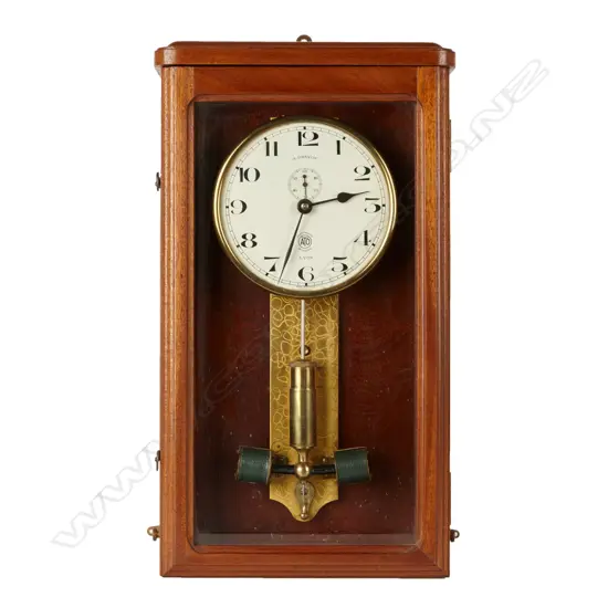 A French electro-mechanical wall clock in mahogany case