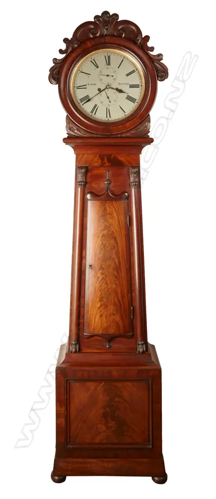 William IV Scottish long case clock in attractive solid mahogany case with round hood surmounted by carvings and tapered trunk with bow front door Image 1++