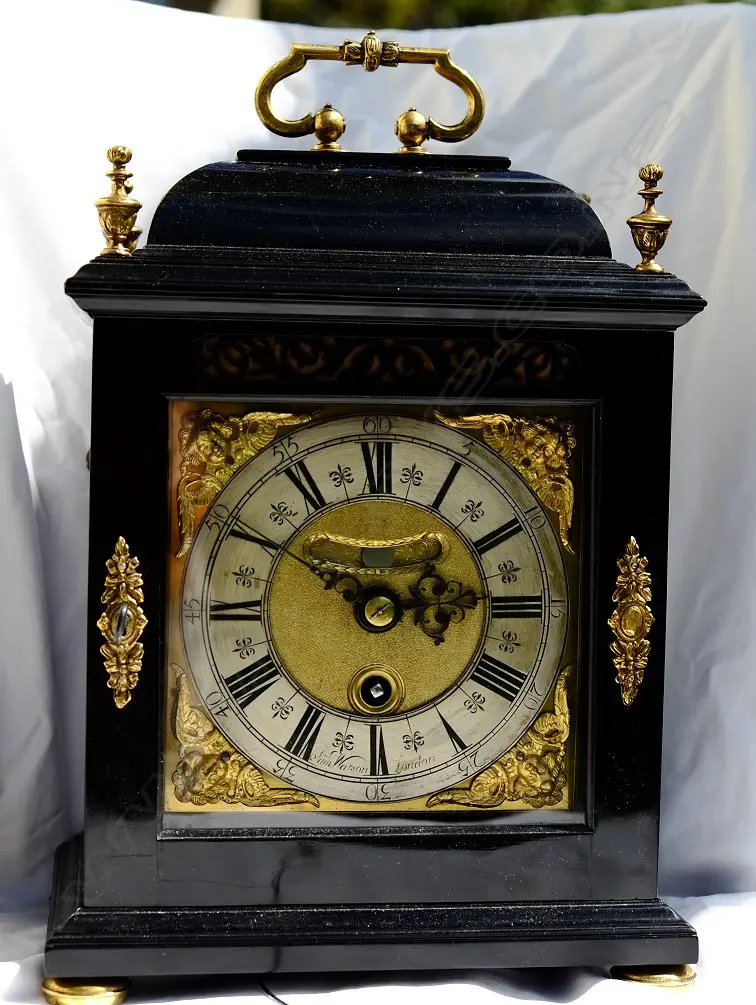 An ebonised spring clock by Sam Watson Image 1++