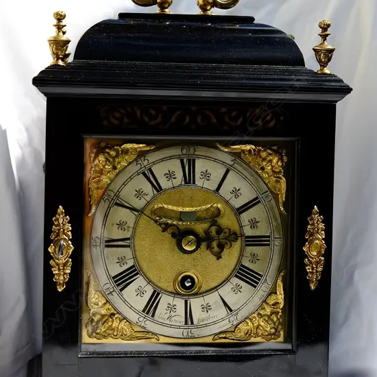 An ebonised spring clock by Sam Watson