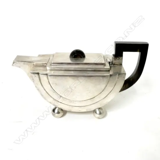 A heavy stylish sterling silver teapot