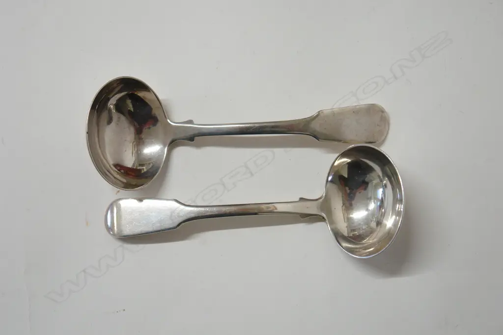 A pair of George III silver sauce ladles Image 1++