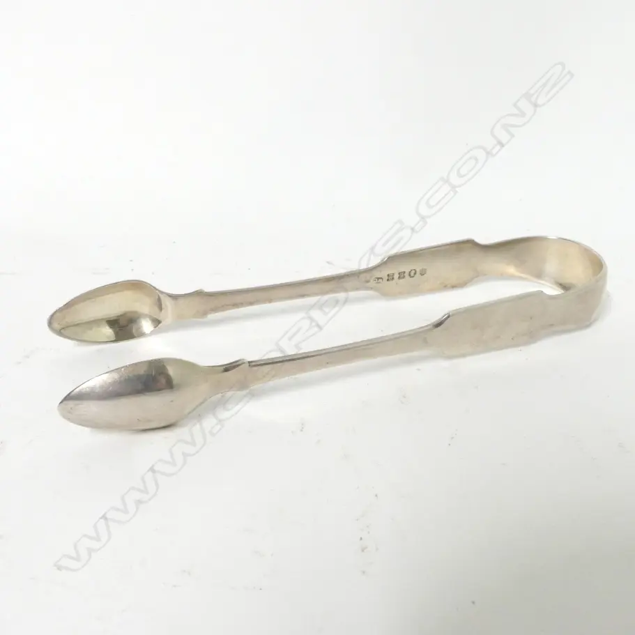 A pair of George IV fiddle pattern Irish silver sugar tongs Image 1++