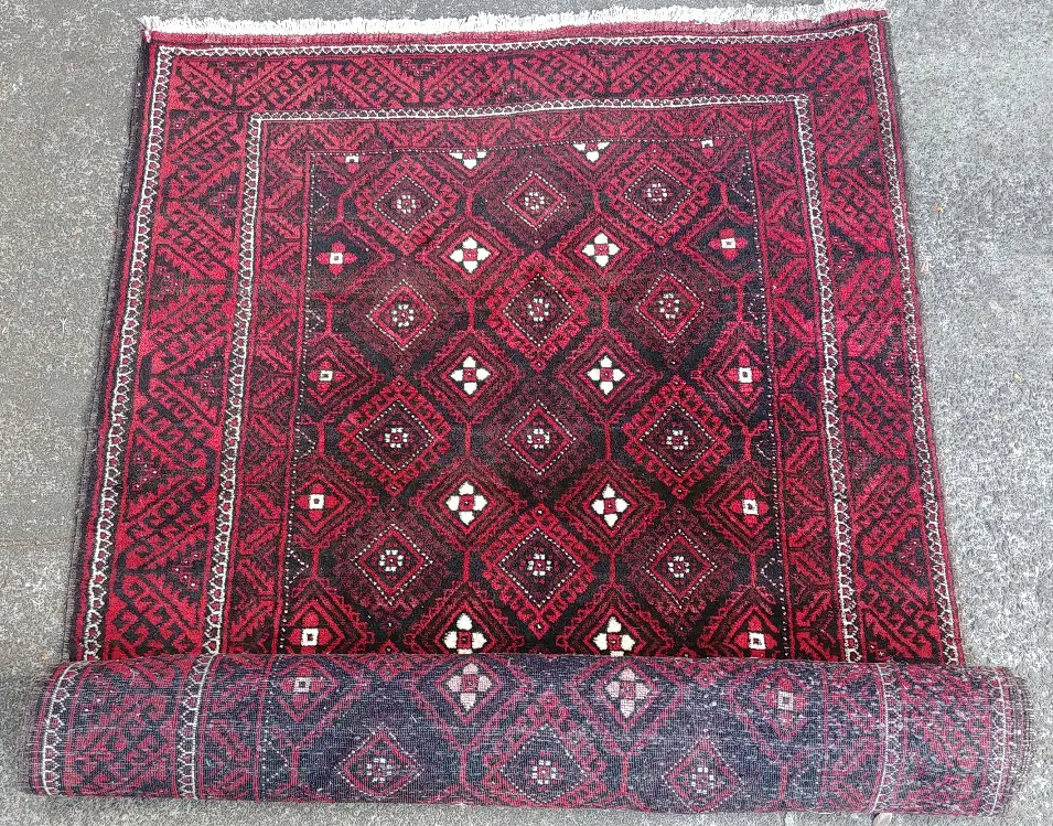 An unusually large hand knotted Baluchi tribal rug Image 1++