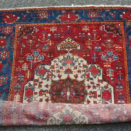 A large hand knotted Hamadan rug