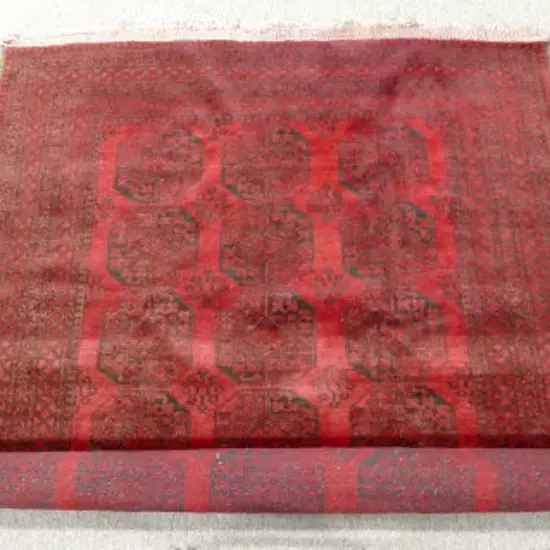 A large hand knotted Afghan Turkoman rug