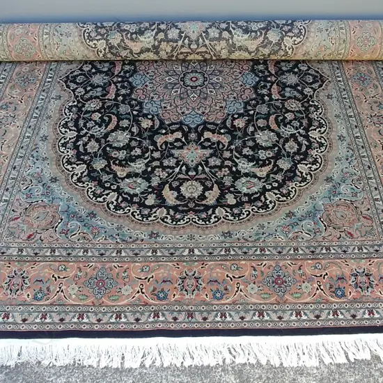 A large finely knotted Persian Tabriz carpet