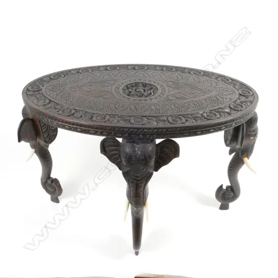 A Kashmiri low table of oval shape